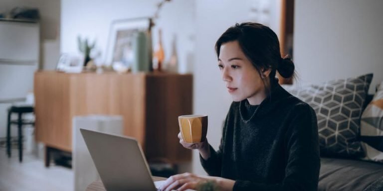 https___specials-images.forbesimg.com_imageserve_60d0c9ff80bd18ef664702c0_Busy-concentrated-young-Asian-woman-working-from-home-working-on-laptop-till-late-in_960x0-1-768×511